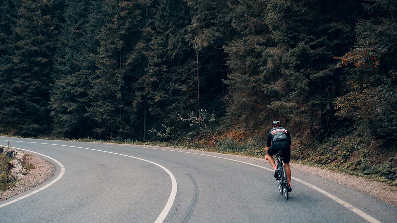 Cyclist on country road